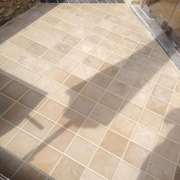 Keerbergen - Aanleg terras in natuursteen 20x20
