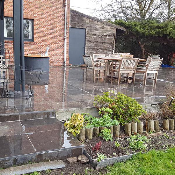 Kampenhout - Aanleg terras blauwe steen 60x60 , 100m² inclusief trappen
