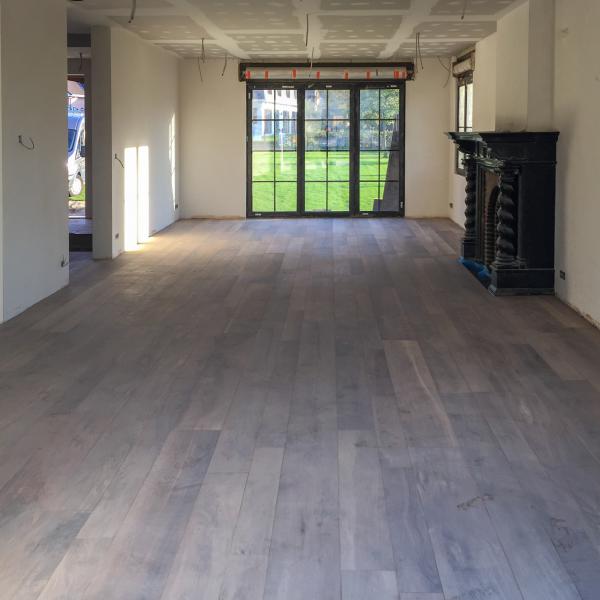 Heverlee - Volledige renovatie woonkamer keramische parket drie verschillende maten